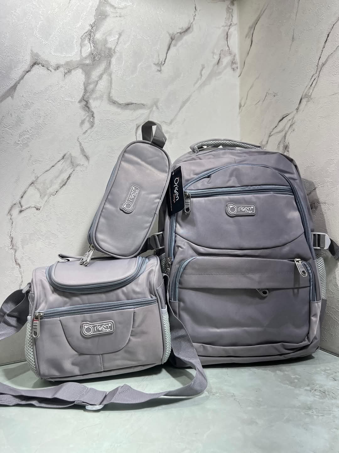 Origen Trio Gris muchi